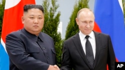 Kuzey Kore lideri Kim Yong Un ve Rusya lideri Vladimir Putin